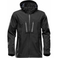 A black softshell jacket features a hood and multiple zippered pockets, with a logo on the sleeve.