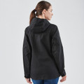 A black women's softshell jacket with a hood, featuring a logo, displayed from the back.