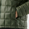 A puffer jacket in a dark green colour featuring a zip closure and a side pocket with a branded logo.