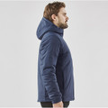 A men's puffer jacket in navy, featuring a hood and side profile view. The jacket has a branding logo.