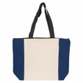 A tote bag featuring a cream centre with navy blue sides and black straps, complete with a zip closure.