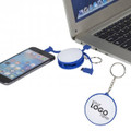 A blue charging cable key ring connected to a phone and laptop, featuring a circular area for branding.