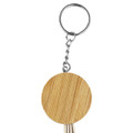 A round bamboo charging cable key ring with a silver metal chain and key ring attachment.