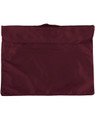 A maroon satchel with a flap closure and handle, featuring a simple, unadorned design.