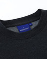 A dark grey crew fleece jumper featuring a round neckline and a branded label inside.