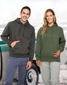 A white fleece hoodie with a front pocket is worn by a male and female model, showcasing the product's fit and style.