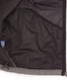 An inside view of a men's softshell high-tech jacket featuring a mesh pocket, predominantly grey in colour.