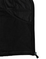 A close-up of the interior of a black softshell jacket, featuring a mesh pocket and zipper detail.