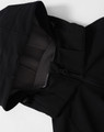 A black men's softshell full zip hoodie featuring a hood and zipped front. It has a logo on the fabric.