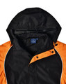 A unisex jacket featuring a black body with an orange hood and accents, showcasing a branded tag inside.