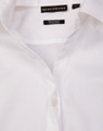 A white, semi-fitted button-up shirt with a dobby striped texture, featuring a collar and button placket. It has a logo.