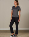 Ladies' utility cargo pants in black, paired with a grey polo shirt, model standing in a neutral setting.