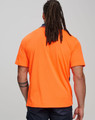 A safety polo shirt in hi-vis orange with a black collar, featuring a logo on the front.