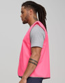 A pink Hi-Vis safety vest displayed on a model, featuring a simple, reflective design.