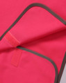 A bright pink safety vest with contrasting grey trim and a Velcro closure. It features a logo on the fabric.