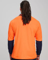 An orange long-sleeve safety polo shirt with navy blue sleeves and a branding logo.