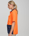 A high-visibility short-sleeve safety polo in bright orange and navy, featuring a pocket and logo.