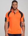Men and woman in high-visibility orange polo shirts with navy sleeves, standing in a construction setting. 