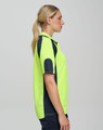 A side view of a high-visibility lime green polo shirt with navy sleeve panels and a logo.