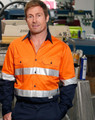 Men's long-sleeve safety shirt in hi-vis orange with reflective tape, featuring a black collar, and a logo.