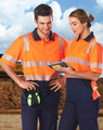 Two individuals wearing high-visibility orange and navy safety polo shirts with reflective stripes, standing outdoors.