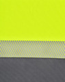 A segmented polo shirt in high-visibility yellow with grey stripes, featuring a textured fabric and a logo.