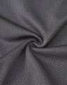 A close-up of dark grey, textured fabric showcasing a breathable mesh design, suitable for work polo shirts.