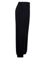 Black fleecy track pants featuring zip cuffs and knee padding, designed for kids, with an elastic waistband.