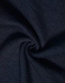 A close-up of dark navy fabric with a smooth, soft texture, showcasing a poly/cotton blend.