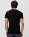 A black premium cotton t-shirt featuring a simple design and short sleeves, with a logo on the back.