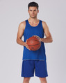 A blue adults' basketball singlet and matching shorts, featuring a logo, with a player holding a basketball.