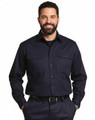 A man wearing a navy long-sleeve cotton work shirt with two front pockets and a button-down collar.