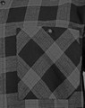 A unisex flannel plaid shirt in shades of black and grey, featuring a button-up design and a chest pocket.