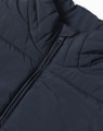 A navy insulated puffer vest featuring a 3D cut with a front zipper and a branded logo.
