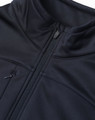 A black sustainable softshell jacket featuring a zip closure and a high collar, with an attached logo.
