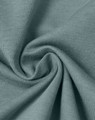 A close-up of a soft, lightweight, textured fabric in a muted teal colour, showcasing its smooth surface and drape.