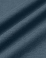 A close-up of soft, premium cotton fabric in a deep blue hue, showcasing its texture and quality.