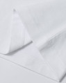 A folded white men's premium cotton t-shirt showcasing neat stitching details and a brand logo.