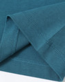 A teal ladies' premium cotton tee shirt, featuring a soft fabric and detailed stitching at the hems.