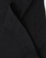 A close-up of a black premium cotton long-sleeve tee shirt, highlighting the stitching and fabric texture.