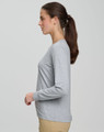 A long-sleeve, grey ladies' premium cotton tee shirt presented on a model in profile. The shirt features a subtle logo.