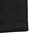 A black fabric close-up featuring a contrast stitch, showcasing texture and seam detail of a polo shirt.
