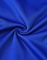A close-up of smooth, vibrant royal blue fabric with a subtle texture, ideal for polo shirts.