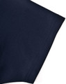 A close-up of a navy poly/cotton polo shirt showcasing the sleeve detail and stitching. The shirt features a logo.