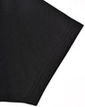 A black polo shirt featuring short sleeves and a contrast detail. The fabric has a smooth texture.