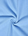 A close-up view of light blue poly/cotton pique knit fabric with a textured weave, showcasing its softness and drape.