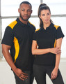 A black polo shirt with yellow accents, featuring a logo, modelled by a man and a woman.