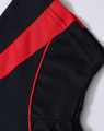 A black and red short-sleeved polo shirt featuring a textured fabric and a branding logo.