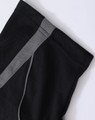 A black polo shirt featuring a grey trim along the shoulder seams and has a branding logo.