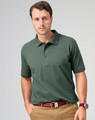 A men's cotton stretch polo in dark green, featuring a collar and a logo, paired with beige trousers.